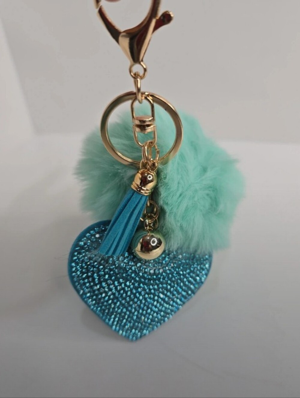 Blue Heart Pom-Pom Keychain with Tassel and Gold Accents